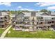 Beautiful condominium exterior with spacious balconies and outdoor furniture on a sunny day at 102 Clarendon Dr # 409, Noblesville, IN 46062