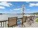 Enjoy stunning lake views from the cozy balcony seating, perfect for relaxation and entertainment at 102 Clarendon Dr # 409, Noblesville, IN 46062