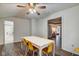 Bright dining room with seating for 6 and access to the Bathroom at 1433 E Fletcher Ave, Indianapolis, IN 46203