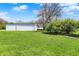 The backyard with a detached garage and blue skies at 1901 N Tillotson Ave, Muncie, IN 47304