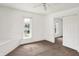 A light-filled bedroom with fresh white walls, trim, and carpet at 1901 N Tillotson Ave, Muncie, IN 47304