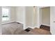 Bedroom featuring wood floor and carpet at 1901 N Tillotson Ave, Muncie, IN 47304
