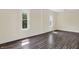 Sunlit bedroom with hardwood floors at 1901 N Tillotson Ave, Muncie, IN 47304