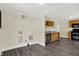 Open kitchen with hardwood floors and stainless-steel appliances at 1901 N Tillotson Ave, Muncie, IN 47304