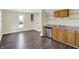 An open kitchen area with hardwood flooring at 1901 N Tillotson Ave, Muncie, IN 47304
