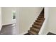 Carpeted stairs and window at 1901 N Tillotson Ave, Muncie, IN 47304