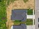 Overhead view of the home showcasing the roof, driveway, and the surrounding lot at 2184 Galleone Way, Plainfield, IN 46168