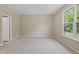 Bright bedroom with a neutral color scheme, large window with a view, and plush carpet at 2184 Galleone Way, Plainfield, IN 46168