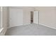 Bedroom with gray carpet, closet with sliding doors, and natural light from a window at 2184 Galleone Way, Plainfield, IN 46168