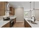 Bright kitchen with stainless appliances, wood cabinets, and white countertops at 2184 Galleone Way, Plainfield, IN 46168