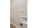 Bright laundry room with washer and dryer hookups and built-in shelving at 2184 Galleone Way, Plainfield, IN 46168