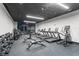 Well-equipped fitness center featuring modern treadmills, weights, and exercise equipment for resident use at 1155 S Rangeline Rd # 504, Carmel, IN 46032