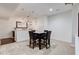 Basement dining area with table and four chairs at 12106 Cabri Ln, Fishers, IN 46037