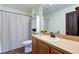 Bathroom with shower/tub combo and wood vanity at 12106 Cabri Ln, Fishers, IN 46037