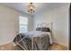 Cozy bedroom with a light-grey metal bed frame at 12106 Cabri Ln, Fishers, IN 46037