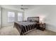 Spacious bedroom with plush carpeting and a ceiling fan at 12106 Cabri Ln, Fishers, IN 46037