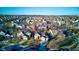 Aerial view of suburban neighborhood with tree-lined streets and homes at 12106 Cabri Ln, Fishers, IN 46037