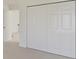 Bedroom featuring a folding door closet with access to the rest of the space at 2898 Creekridge Ct, Columbus, IN 47201