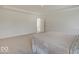 Bright bedroom with carpet, natural light, access to another room, and a comfortable bed at 2898 Creekridge Ct, Columbus, IN 47201