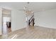 The room features hardwood floors, an elegant chandelier, and access to the kitchen area at 2898 Creekridge Ct, Columbus, IN 47201
