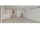 Upstairs loft area with neutral carpeting and plenty of space for entertaining guests at 2898 Creekridge Ct, Columbus, IN 47201