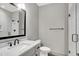 Bathroom features a glass enclosed shower, vanity with modern fixtures at 82 E Wayne St # C, Franklin, IN 46131