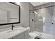 Modern bathroom featuring a glass-enclosed shower and a sleek vanity with black hardware at 82 E Wayne St # C, Franklin, IN 46131