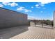 Rooftop deck with railings and wood flooring at 82 E Wayne St # C, Franklin, IN 46131