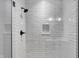 Modern shower with subway tile and glass door at 82 E Wayne St # C, Franklin, IN 46131