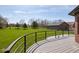 Expansive backyard featuring a well-maintained lawn, mature trees, and a detached garage at 4499 W 131St St, Carmel, IN 46074