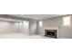A carpeted basement with recessed lights, a fireplace and windows at 4499 W 131St St, Carmel, IN 46074