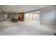 Large finished basement with custom bar area and open floor plan at 4499 W 131St St, Carmel, IN 46074