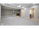 Spacious finished basement with neutral carpet and paint, offering versatile living space at 4499 W 131St St, Carmel, IN 46074