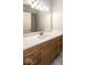 Bathroom featuring a sink with a modern vanity and a large mirror at 4499 W 131St St, Carmel, IN 46074