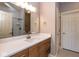 Bathroom featuring a sink with a modern vanity and a large mirror at 4499 W 131St St, Carmel, IN 46074