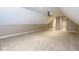 Spacious bonus room with projector screen, carpeting and neutral walls at 4499 W 131St St, Carmel, IN 46074
