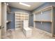 Well-organized walk-in closet with custom shelves and ample hanging space at 4499 W 131St St, Carmel, IN 46074