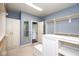 Spacious walk-in closet offering custom shelves, cabinets, and ample storage at 4499 W 131St St, Carmel, IN 46074