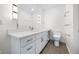Bathroom showcasing a modern vanity with ample storage and a sleek toilet at 806 7Th St, Columbus, IN 47201