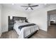Comfortable bedroom with a modern bed, sleek side tables, and hardwood floors at 806 7Th St, Columbus, IN 47201