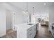 Stylish kitchen with a large island, modern fixtures, and an open layout, perfect for entertaining at 806 7Th St, Columbus, IN 47201