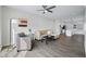 Bright living room with hardwood floors, stylish furnishings, and open kitchen view at 806 7Th St, Columbus, IN 47201