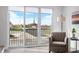 Bright living room featuring a large window with a view, comfortable chair, and modern decor at 806 7Th St, Columbus, IN 47201