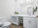 Bright bathroom with a modern vanity, ample counter space, and a neutral color scheme at 822 7Th St, Columbus, IN 47201