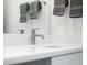 Close-up of bathroom sink with a sleek silver faucet and towel racks at 822 7Th St, Columbus, IN 47201