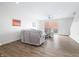 Spacious living room area with hardwood floors, bright walls, and comfortable furniture at 822 7Th St, Columbus, IN 47201