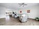 Open layout showcases the kitchen, living room, and laminate flooring at 822 7Th St, Columbus, IN 47201