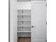 Walk-in pantry with built-in shelving, offering organized storage space with easy access at 822 7Th St, Columbus, IN 47201