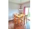 Bright dining room featuring a wood table, chandelier, and sliding glass doors at 6343 Central Blvd, Whitestown, IN 46075