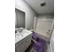Clean bathroom featuring a shower-tub combo, single sink vanity, and tiled floor at 696 Scarsdale Ln, Danville, IN 46122